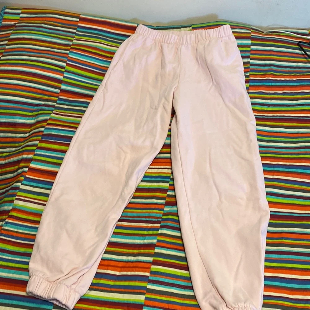 John Galt, this light pink joggers with pockets and size tag is cut nice quality